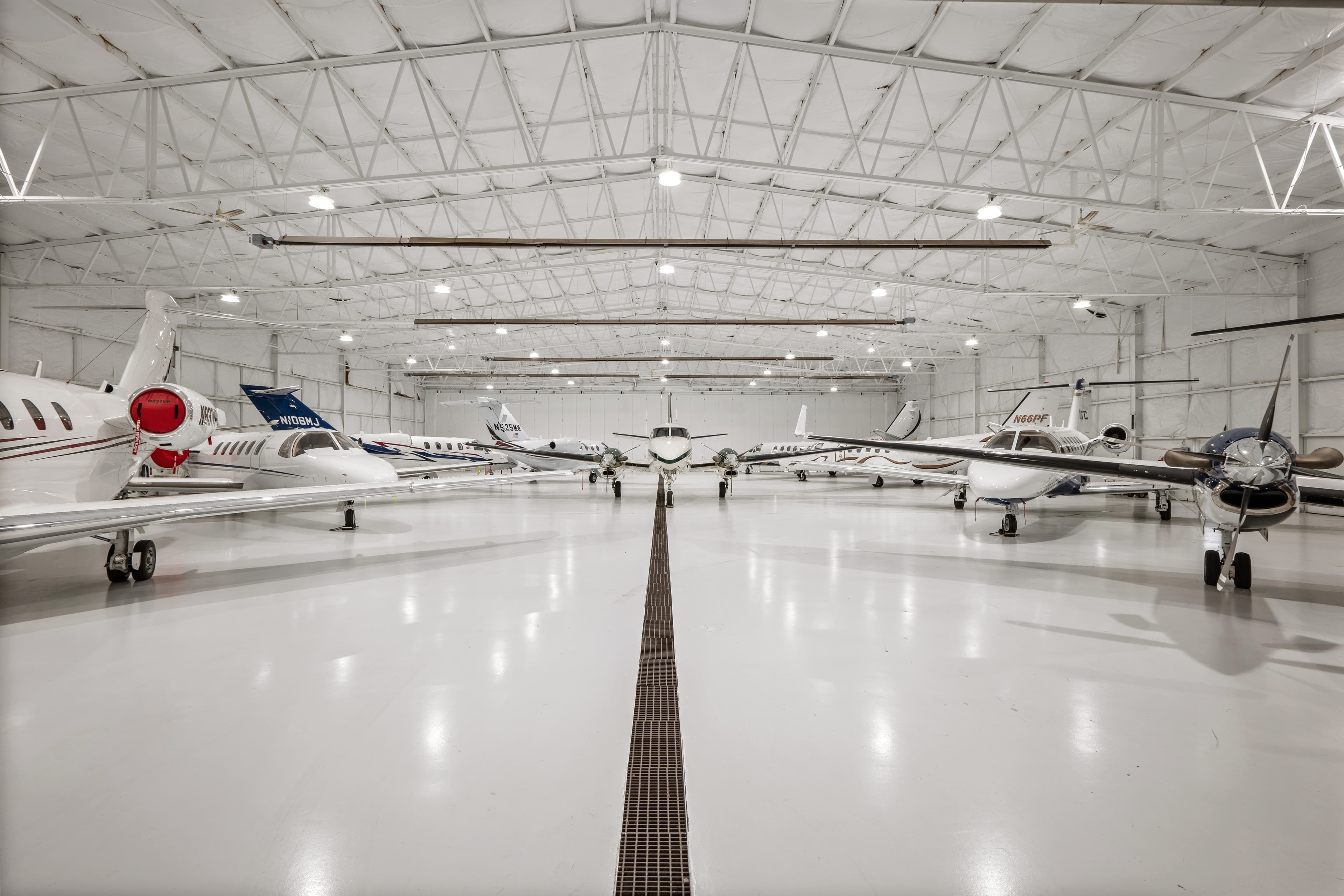 Aircraft parked inside the heated hangar at Michigan Aviation, KPTK