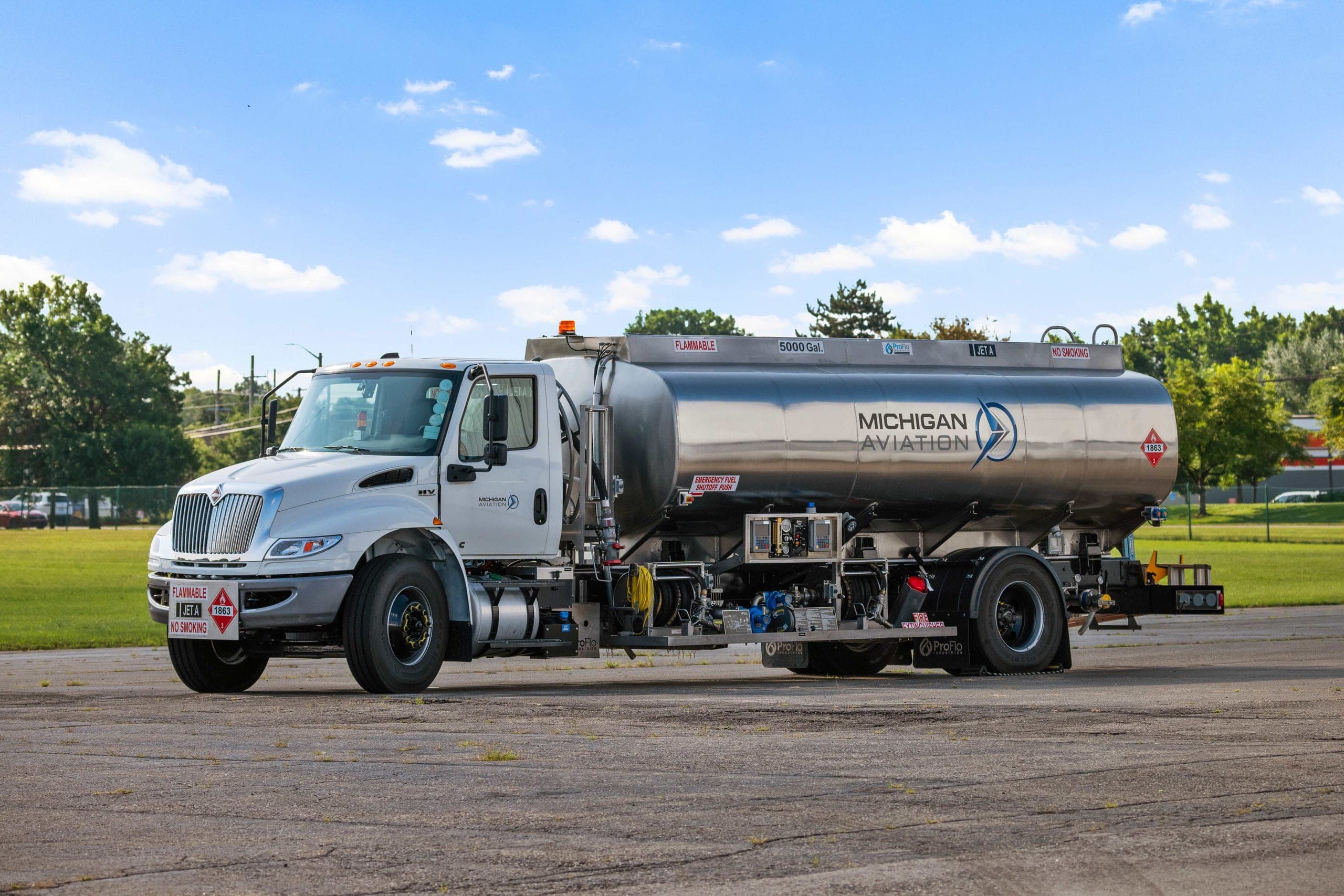 Michigan Aviation Jet-A refueling truck positioned on the ramp at Oakland County International Airport
